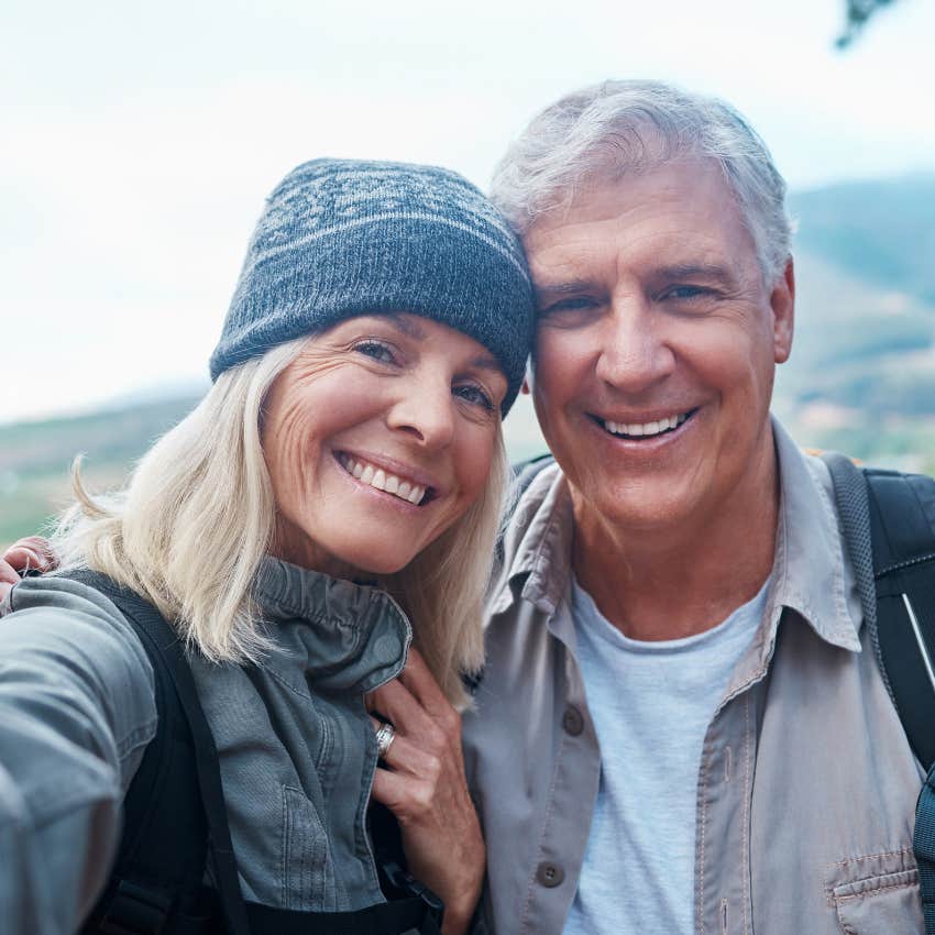 wife with strong mental health on a hiking vacation with her husband