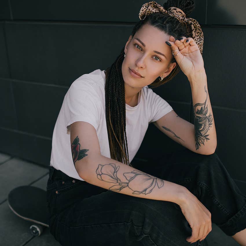 woman with more than one tattoo posing