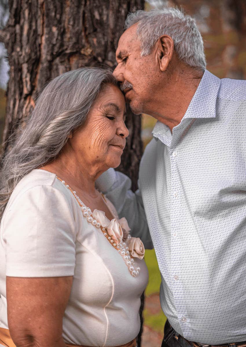 senior couple embracing each other gently