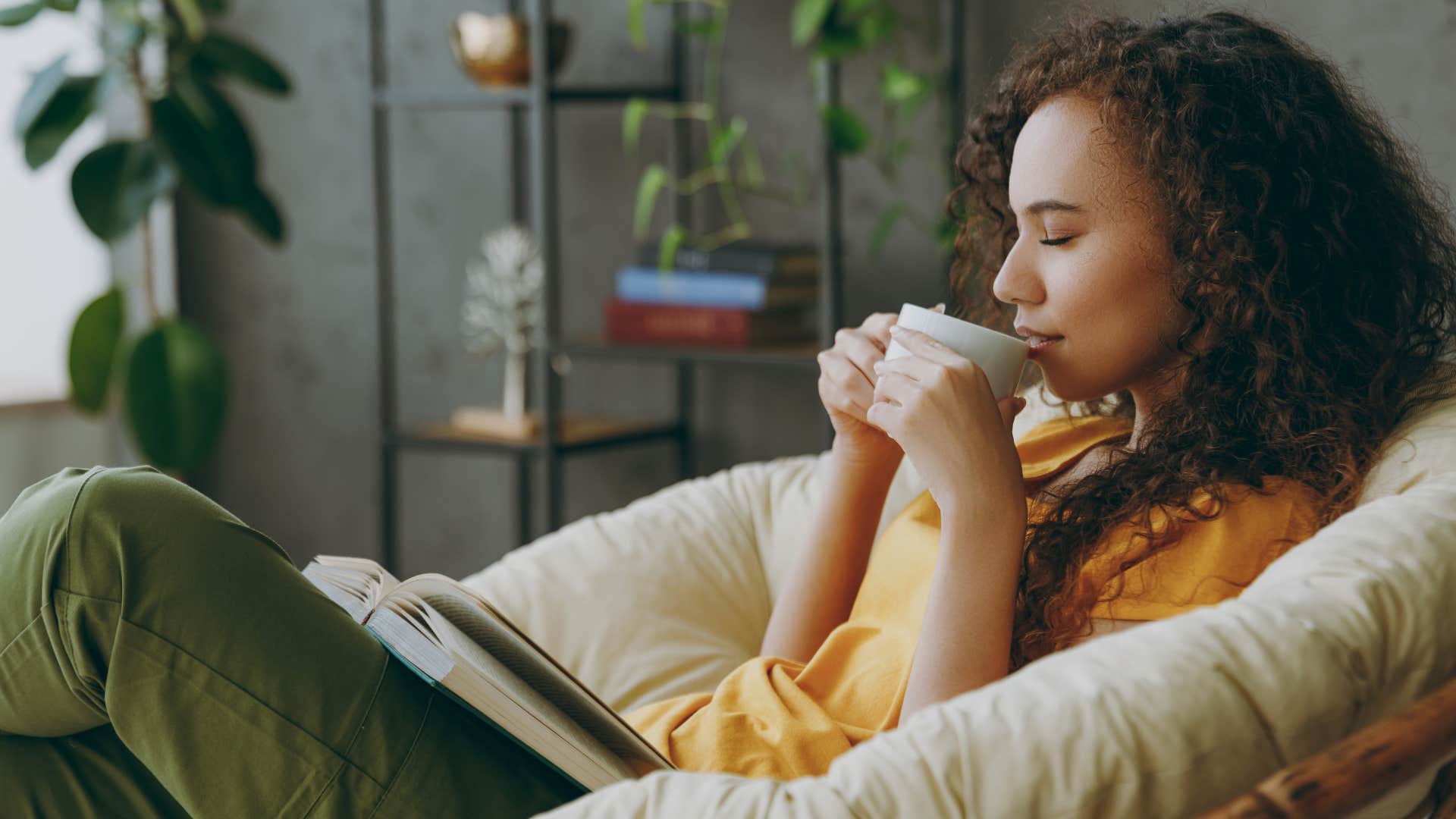 woman sipping tea enjoying her daily routine