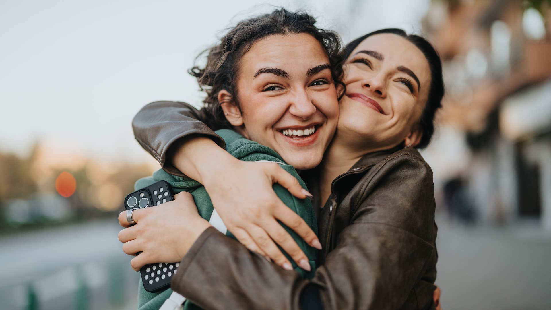 friends hugging being their true selves with each other