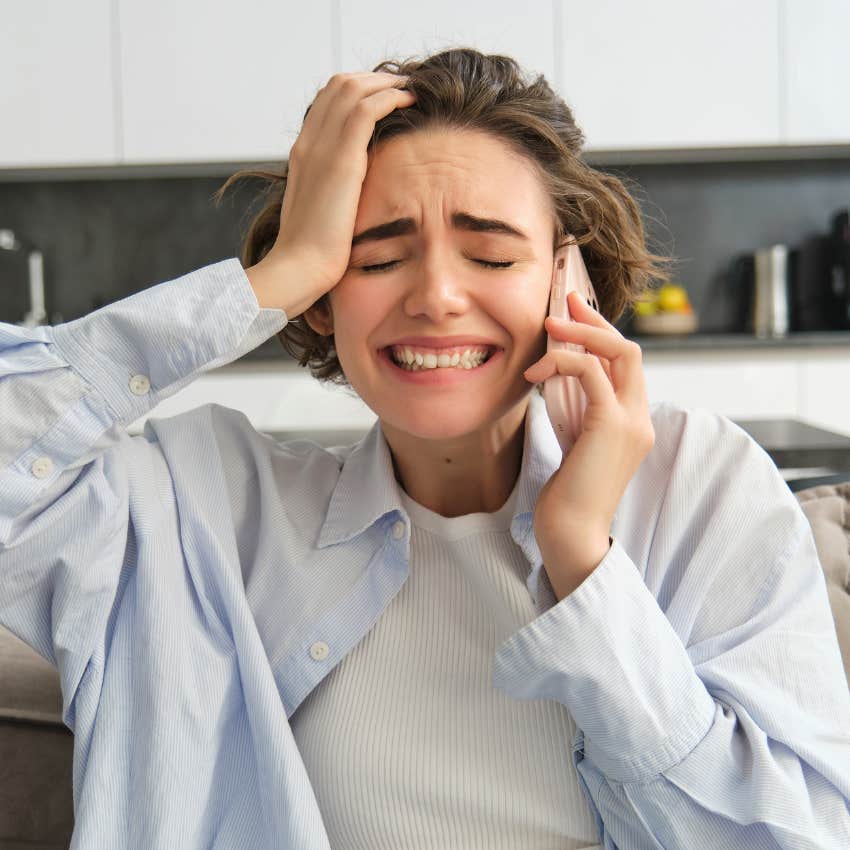 disappointed woman being told no on the phone