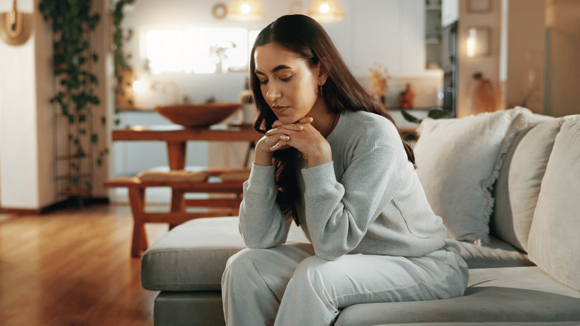 woman who has a complicated relationship with her family and feels guilty for setting boundaries