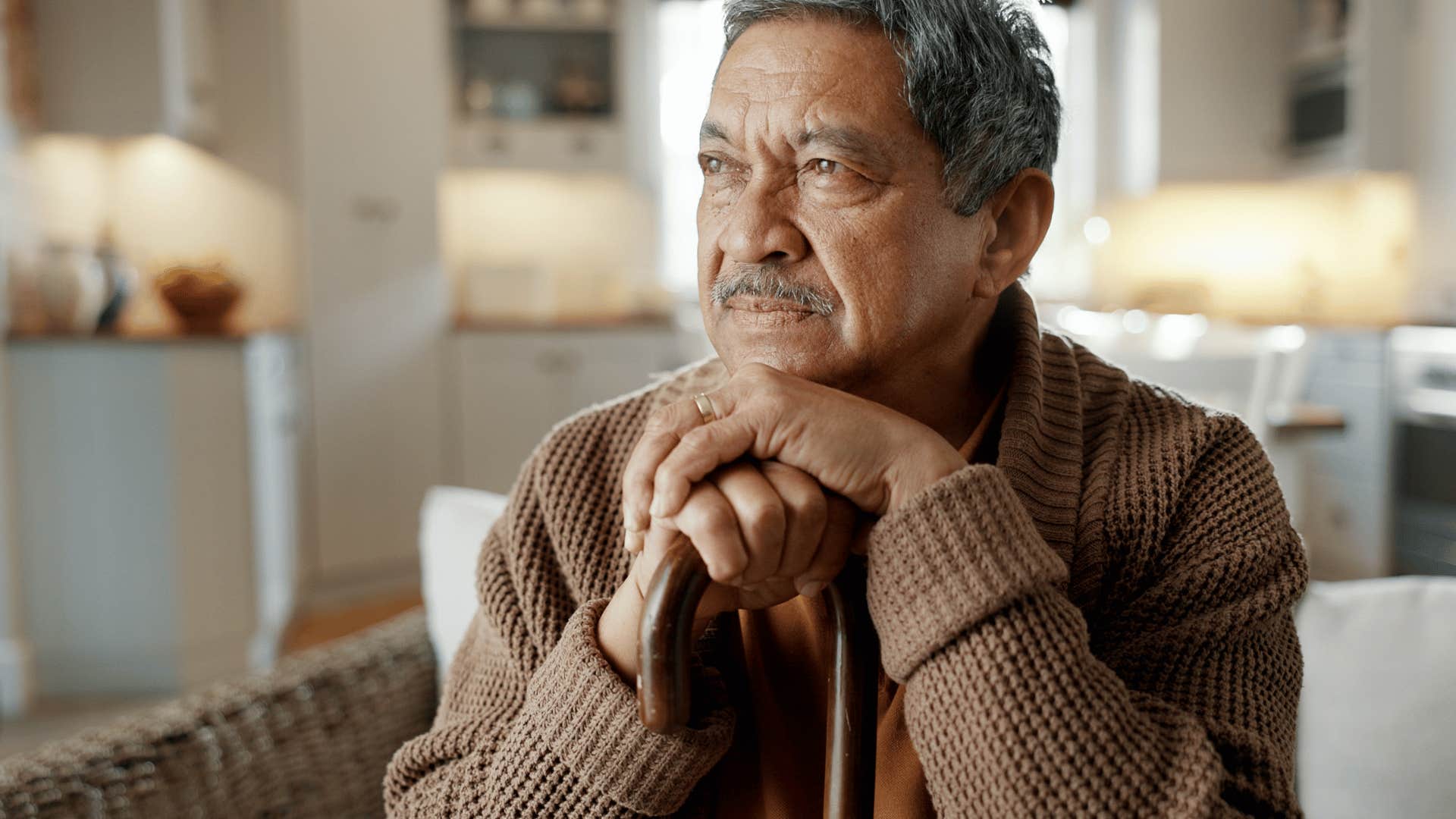 man who has a complicated relationship with his family as he holds himself to a standard