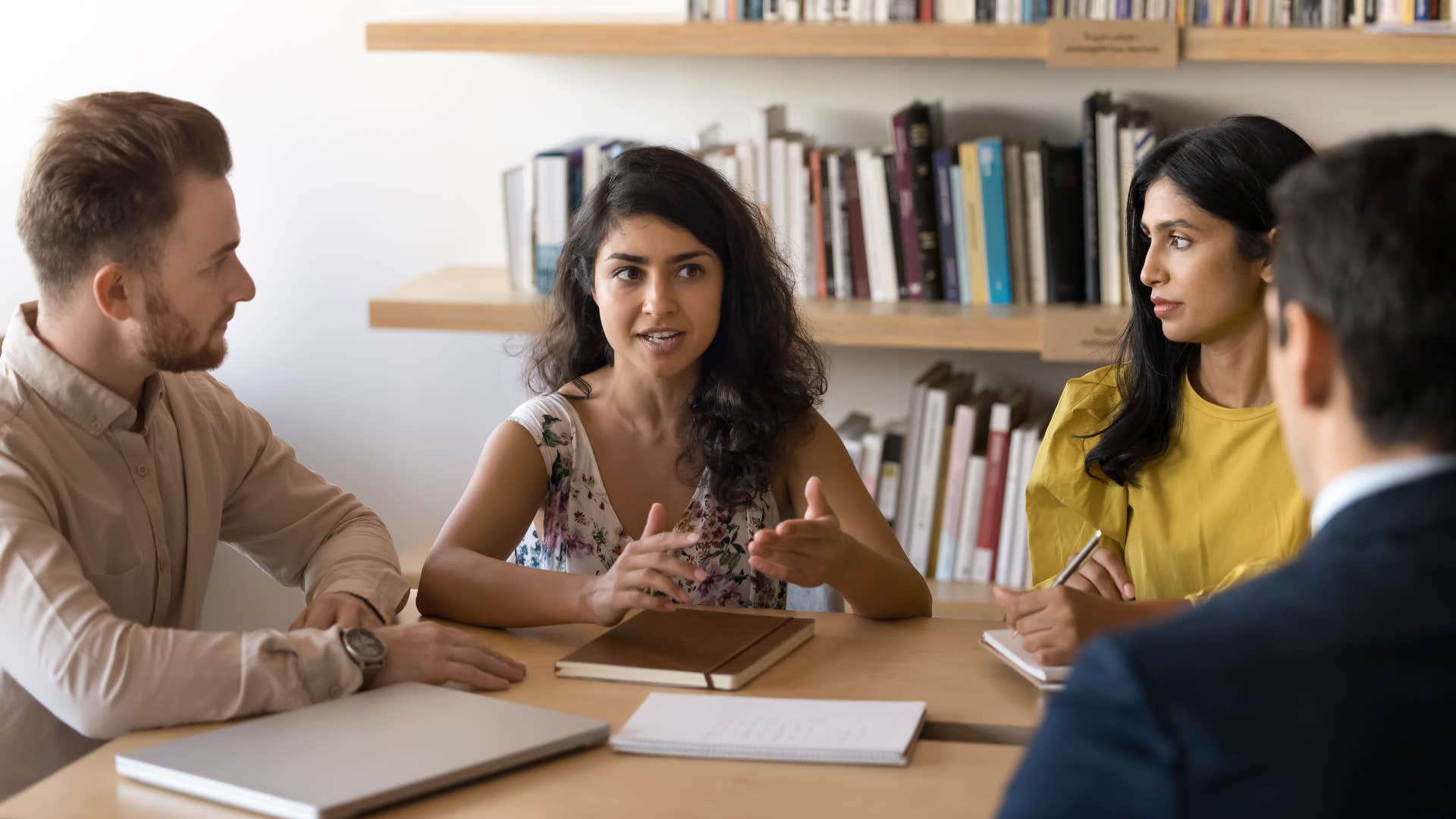 woman who is a bad person putting on a front around colleagues