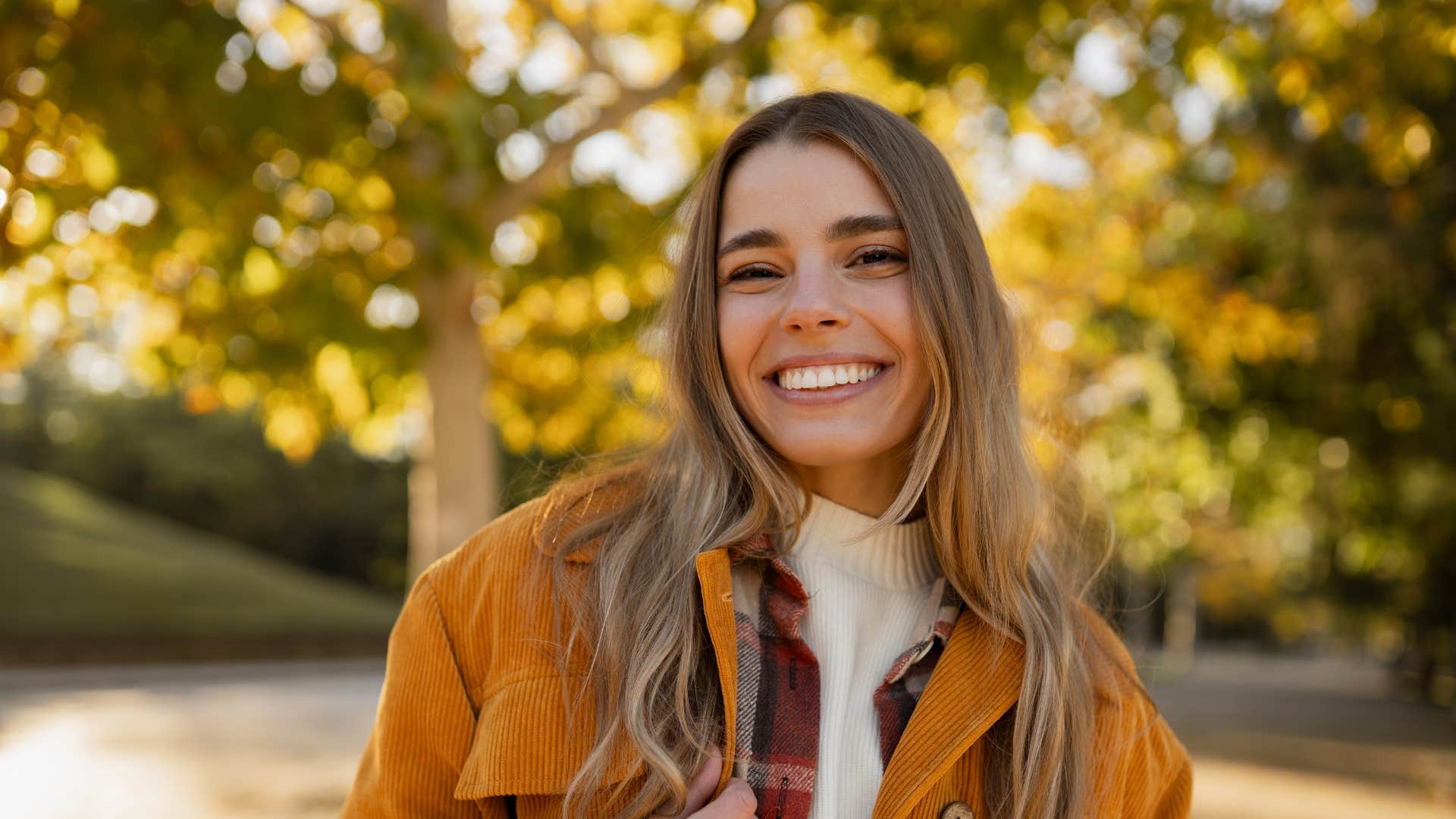 happy woman smiling being her true authentic self