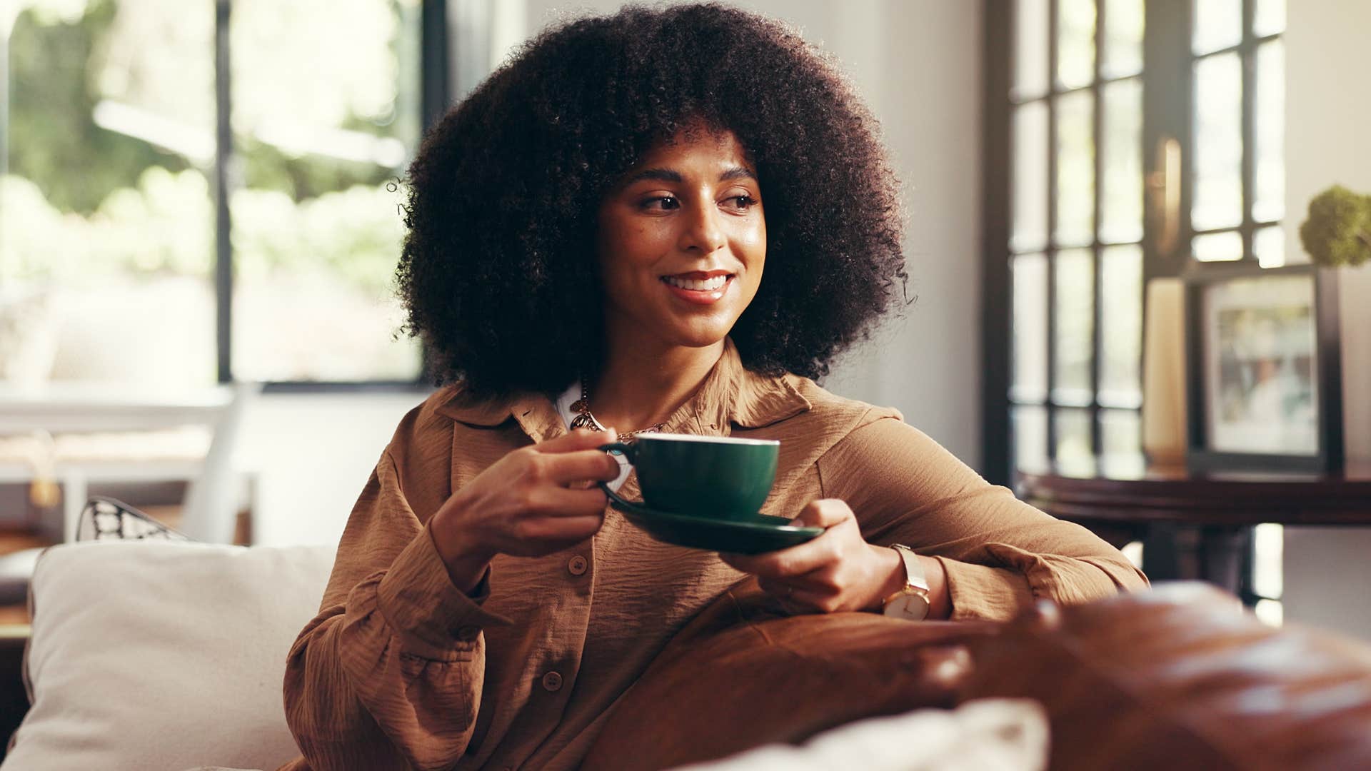 peaceful woman avoiding drama sitting alone at home