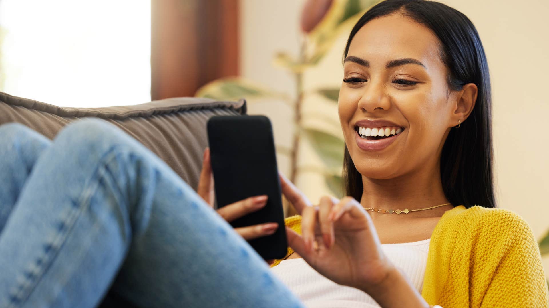 happy confident woman scrolling social media without posting for validation