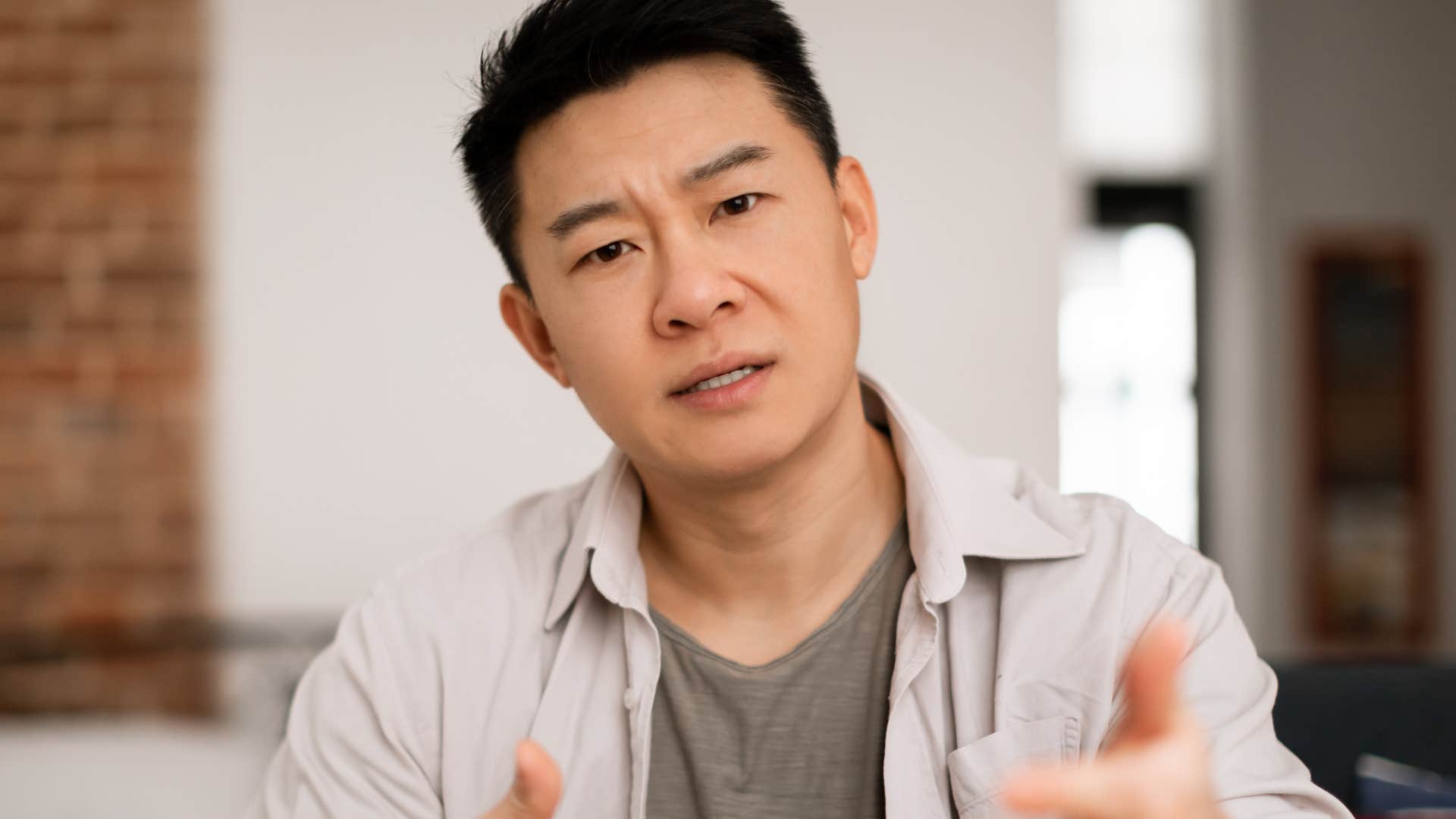 man who takes action when he complains talking to colleague