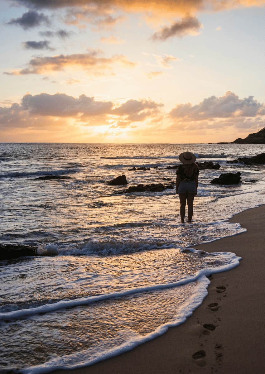 silhouette of person on tropical beach