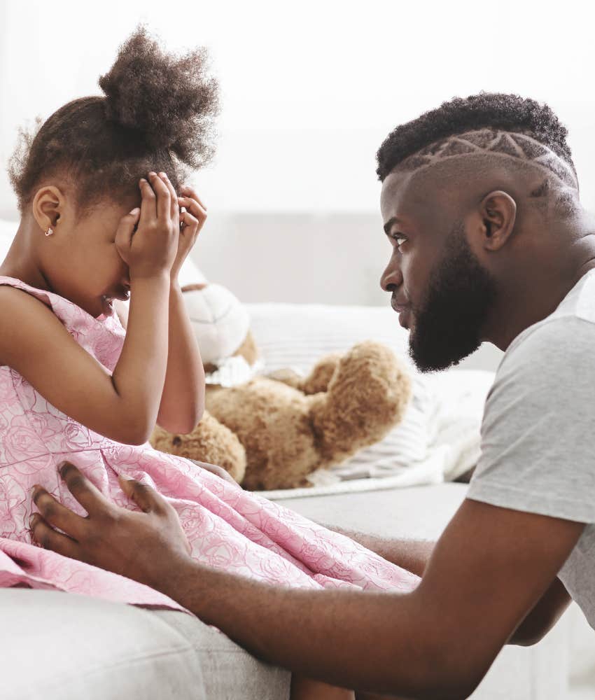 loving parent brings calm to whining child