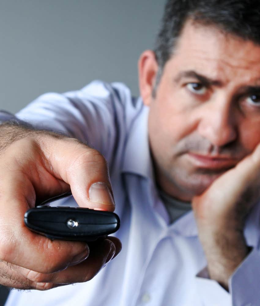 older man with remote showing need to shut off false promises