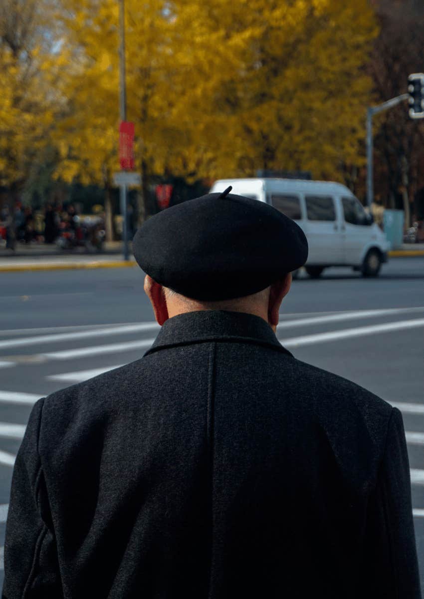 successful adaptable man standing at a crossroads