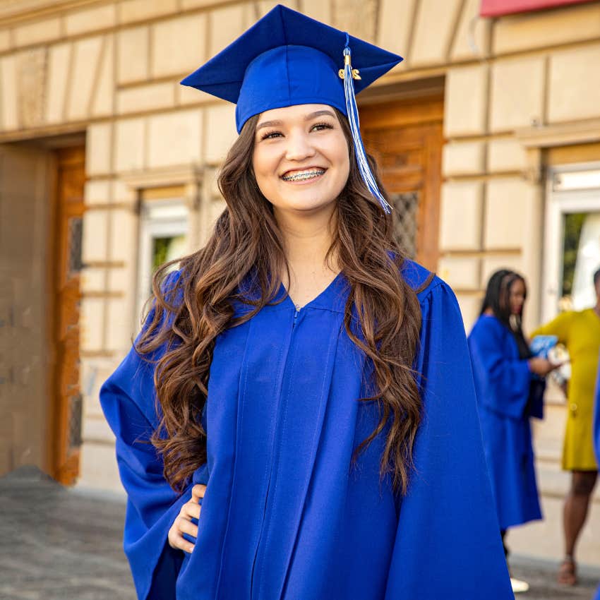 teen girl celebrating the important milestone of high school graduation