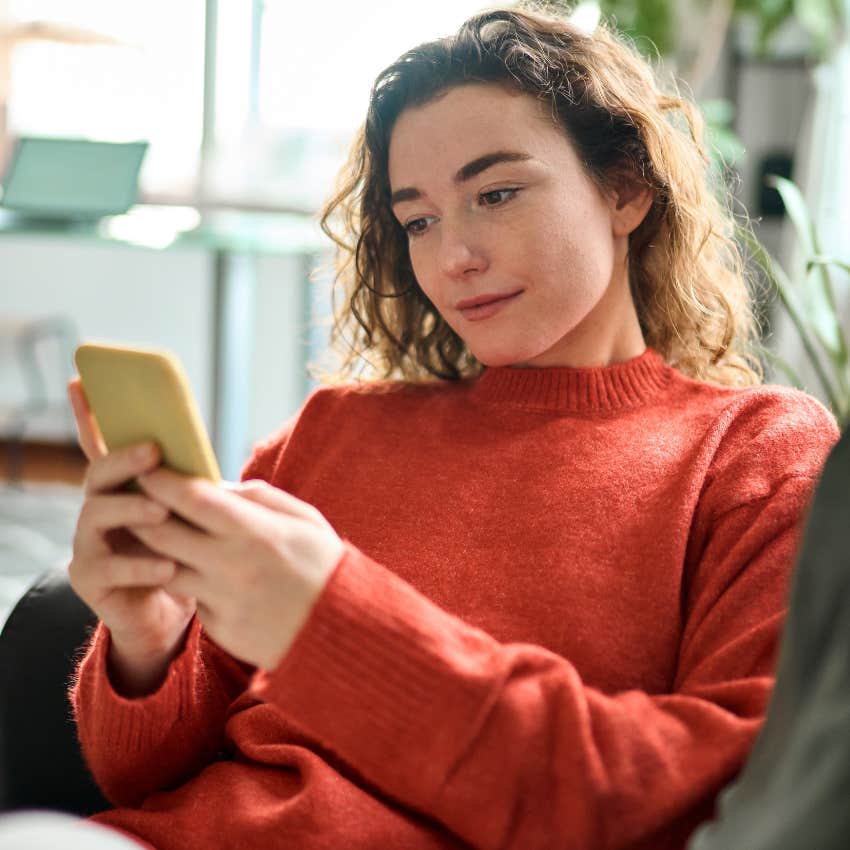 woman protecting herself from bad things happening by reading text messages twice