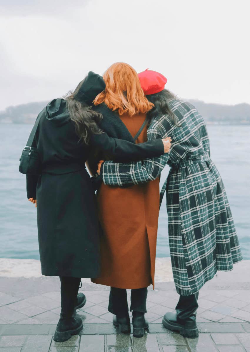 supportive friends hugging