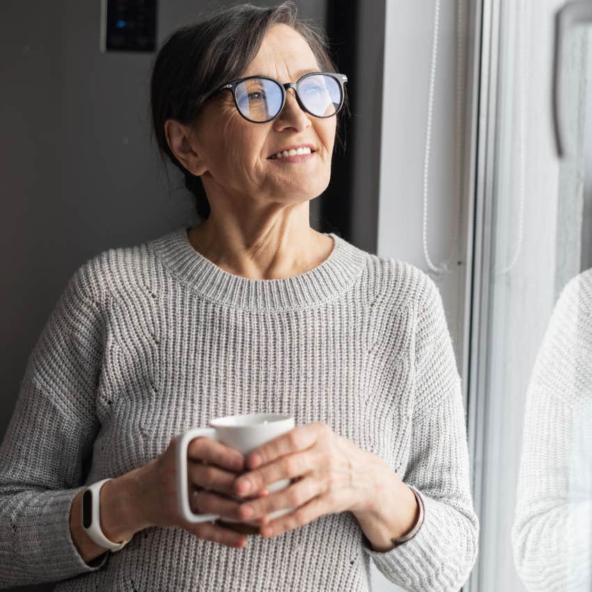 intelligent woman who notices the little things staring outside