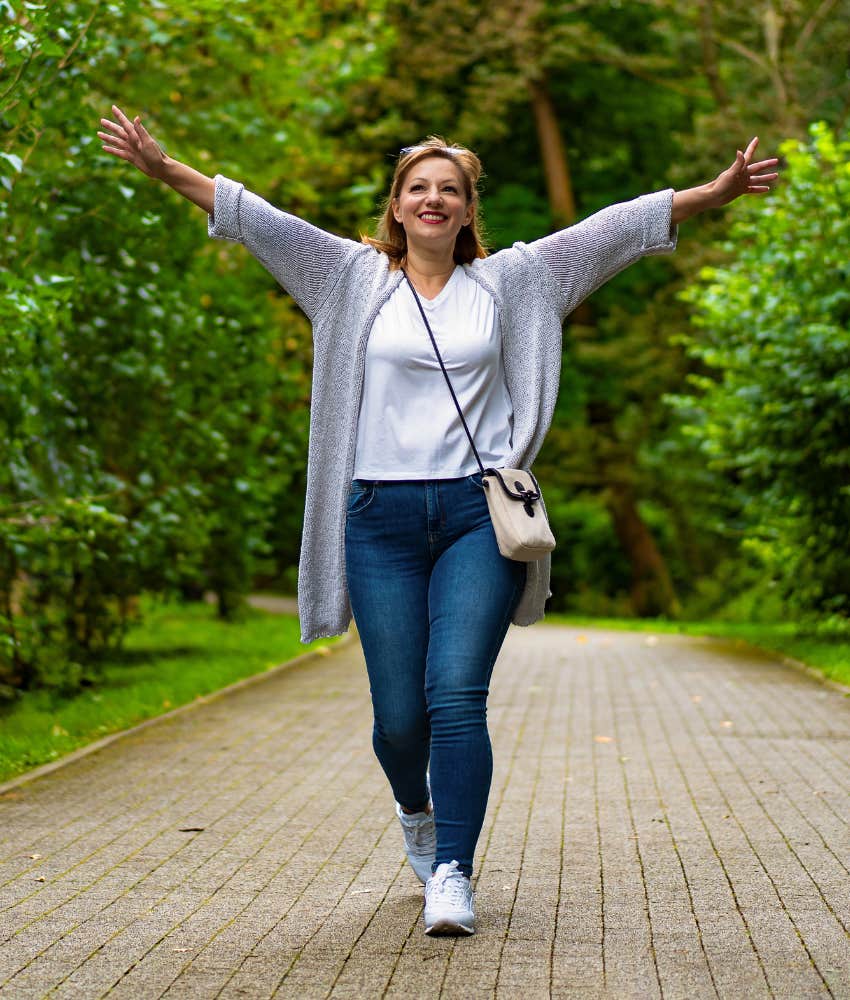 joyful woman walks to stop worrying too much