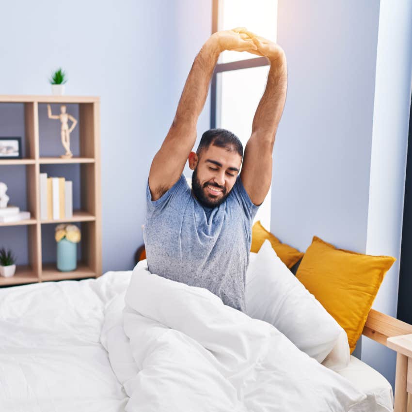 man stretching and going through his morning affirmations