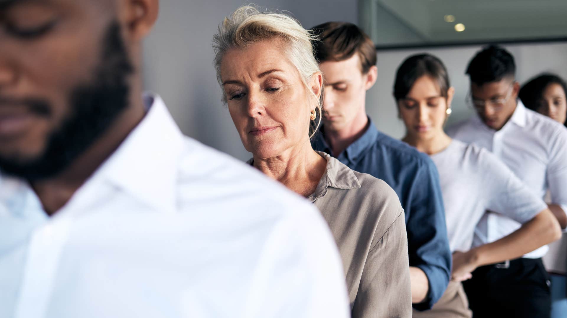 boomer woman standing too close in line