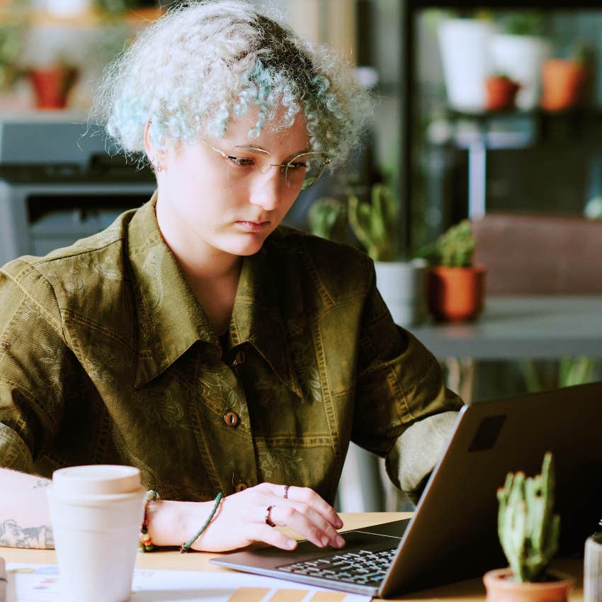 Gen Zer on their laptop at work using their digital intuition