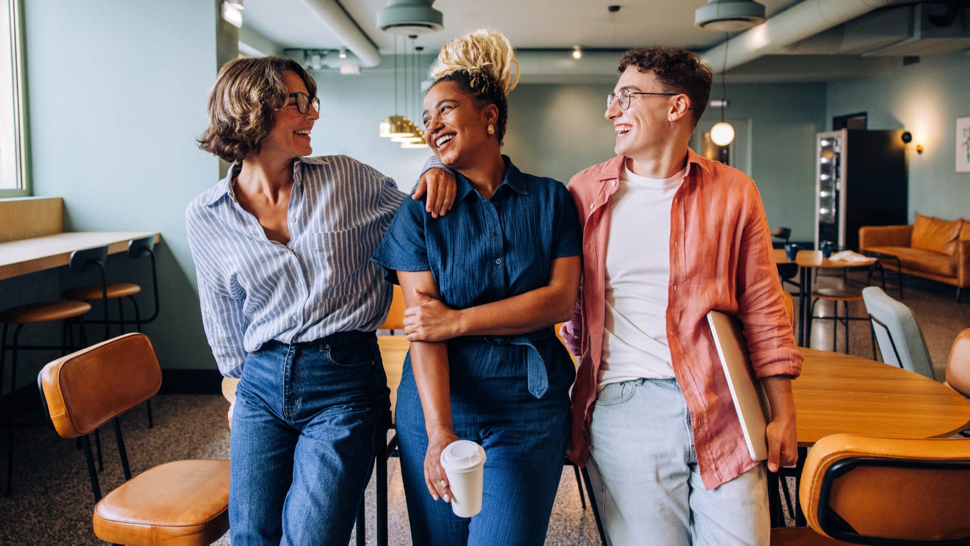 friendly gen z colleagues acting like a family at work