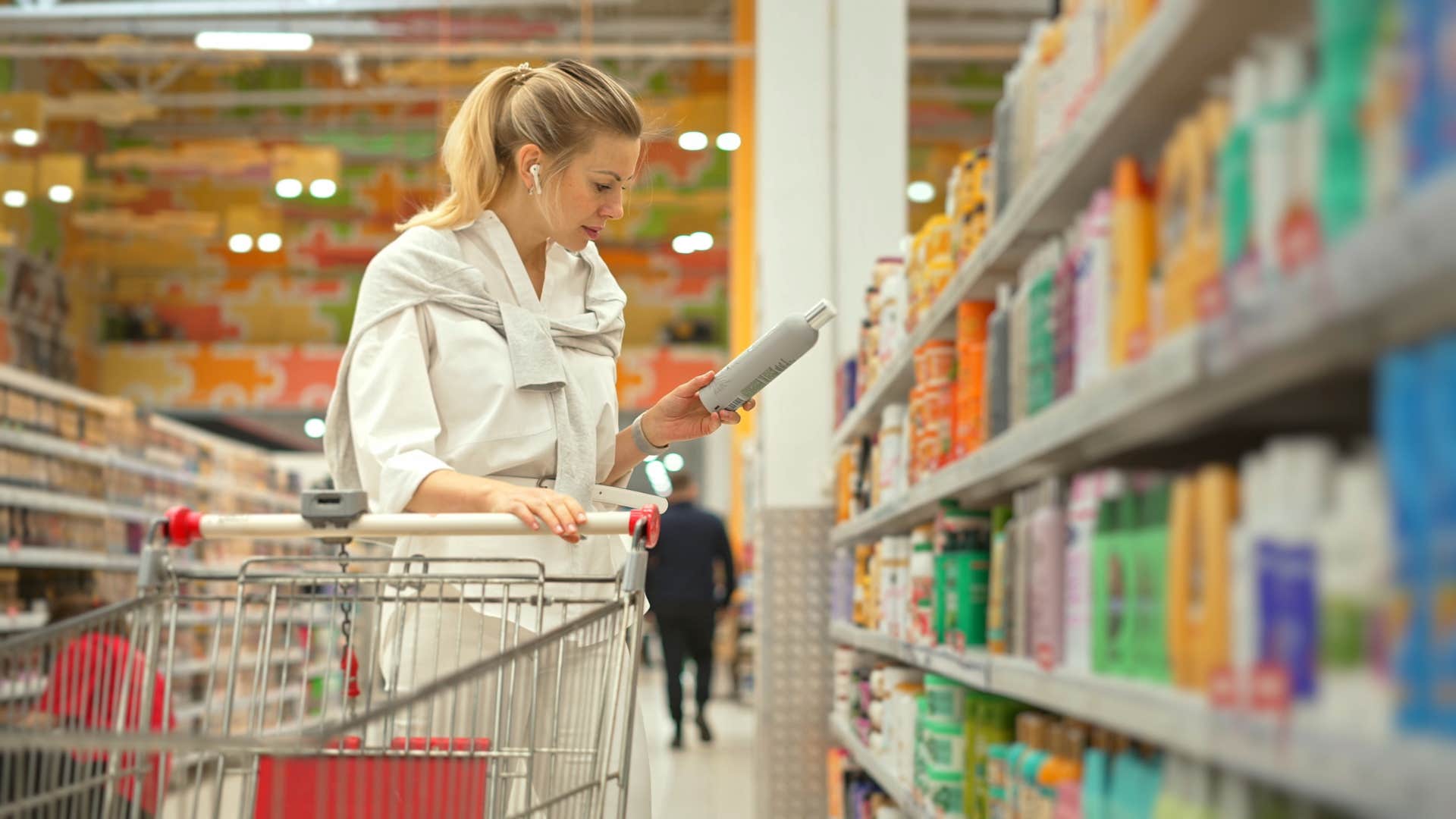 lower income woman shopping for trendy items at the store