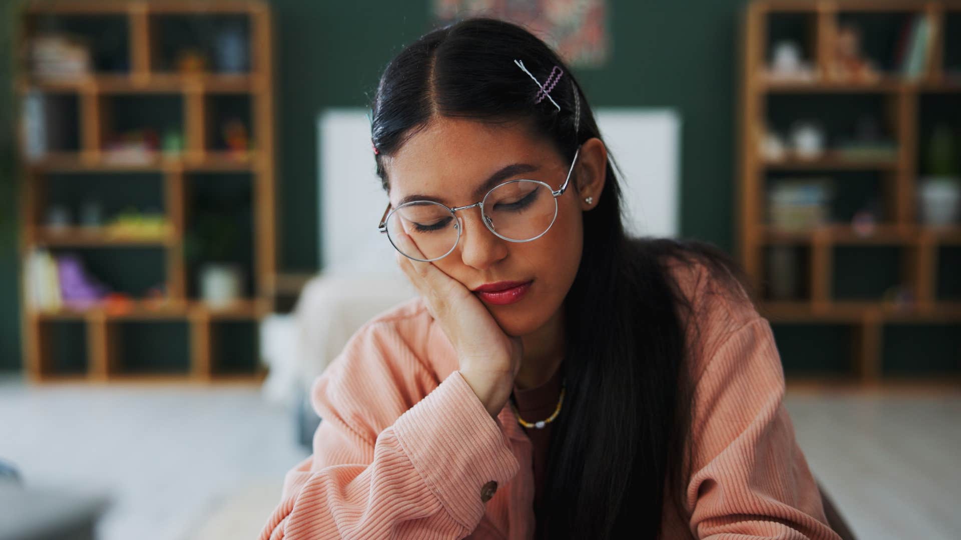 intelligent woman feeling bored in situations she should enjoy