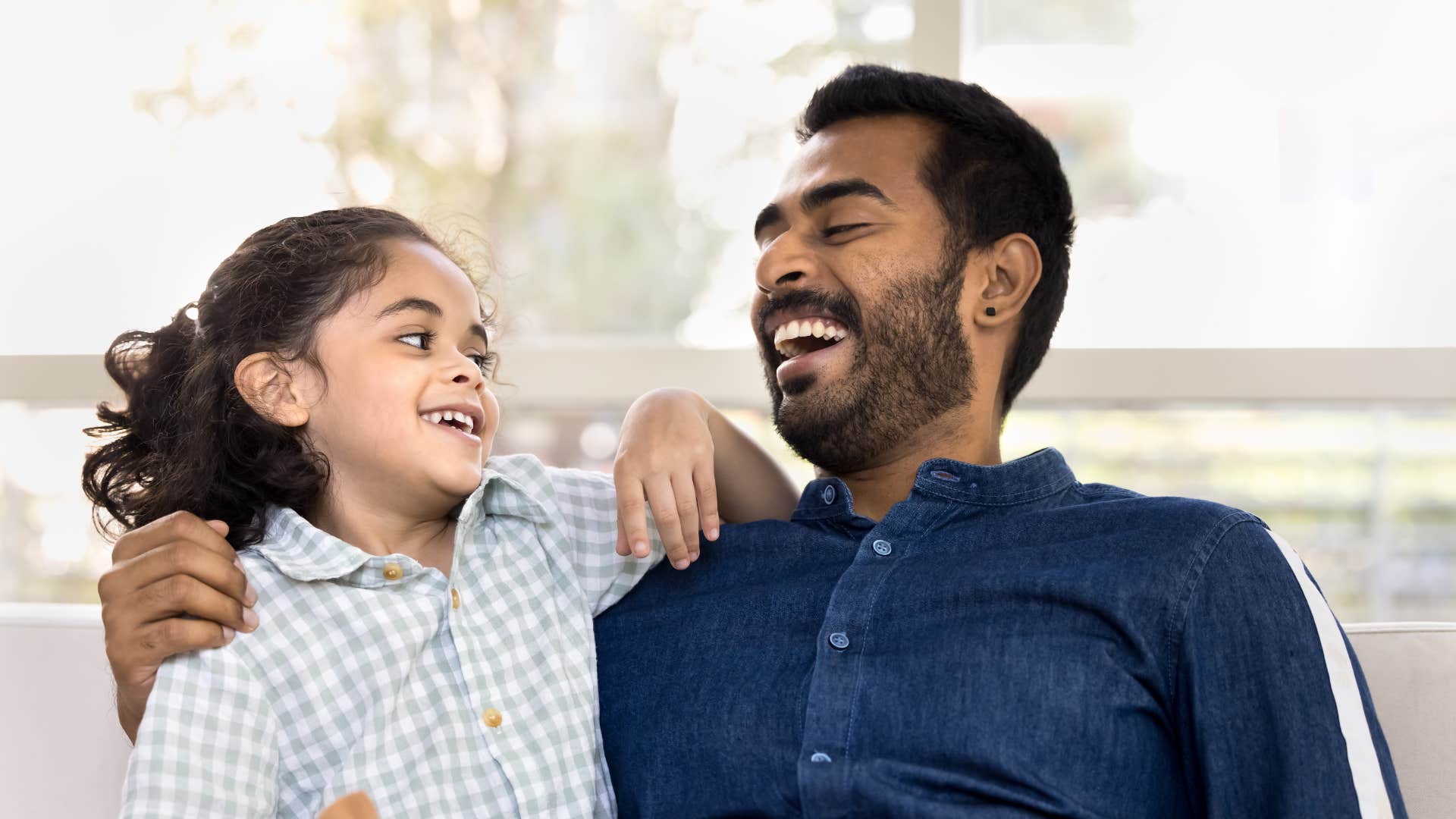happy parent and child are grateful for each other