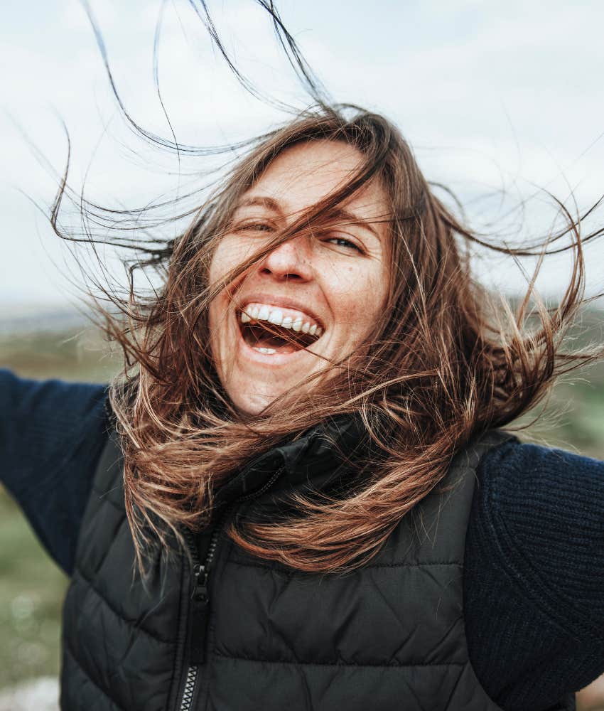 happy person outside showing recess from adult life