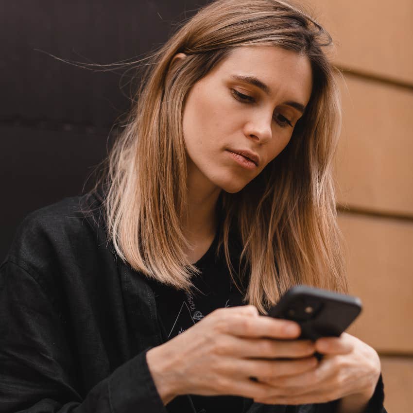 woman chasing people who don't care texting on her phone