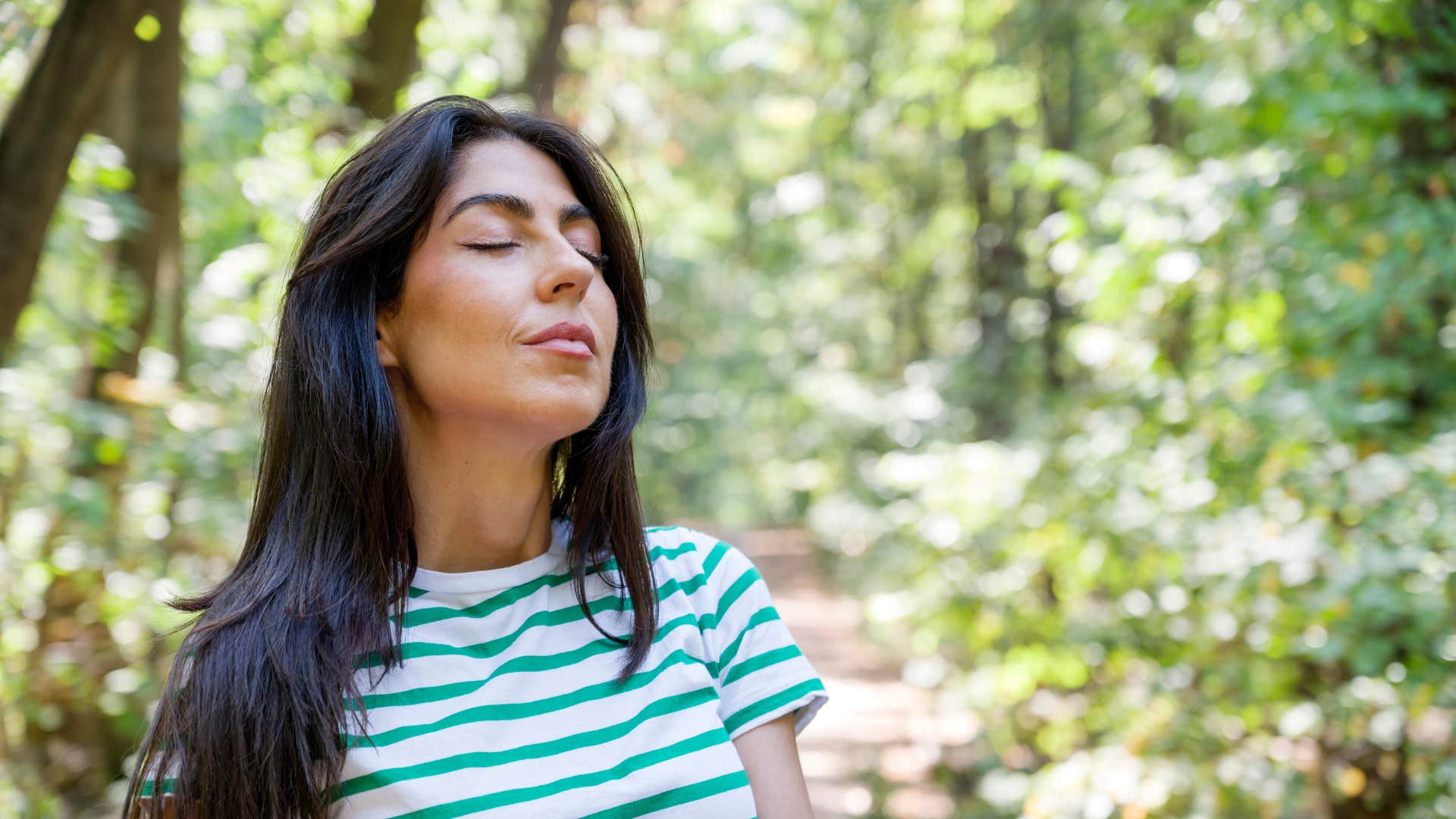 woman calmly standing outside choosing peace over drama