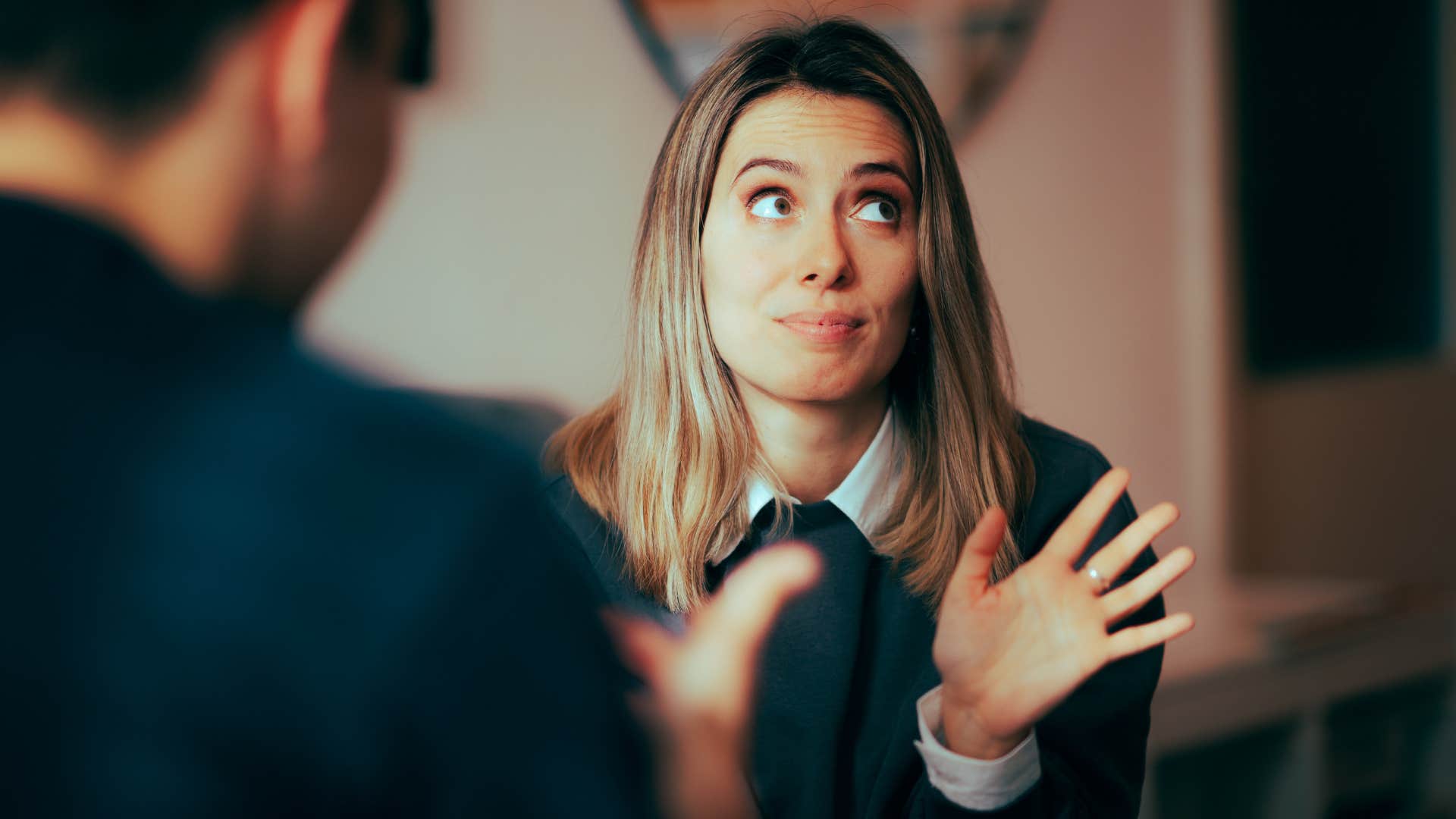 woman annoyed with man who is disrespecting her