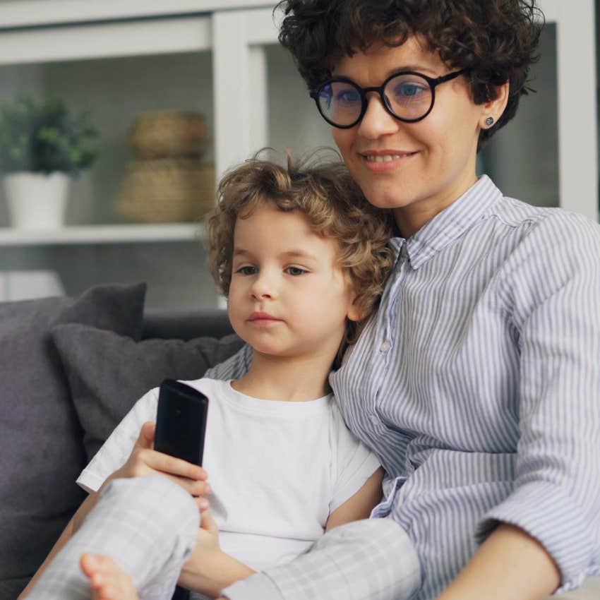 mom and son watching tv because it's less stimulating
