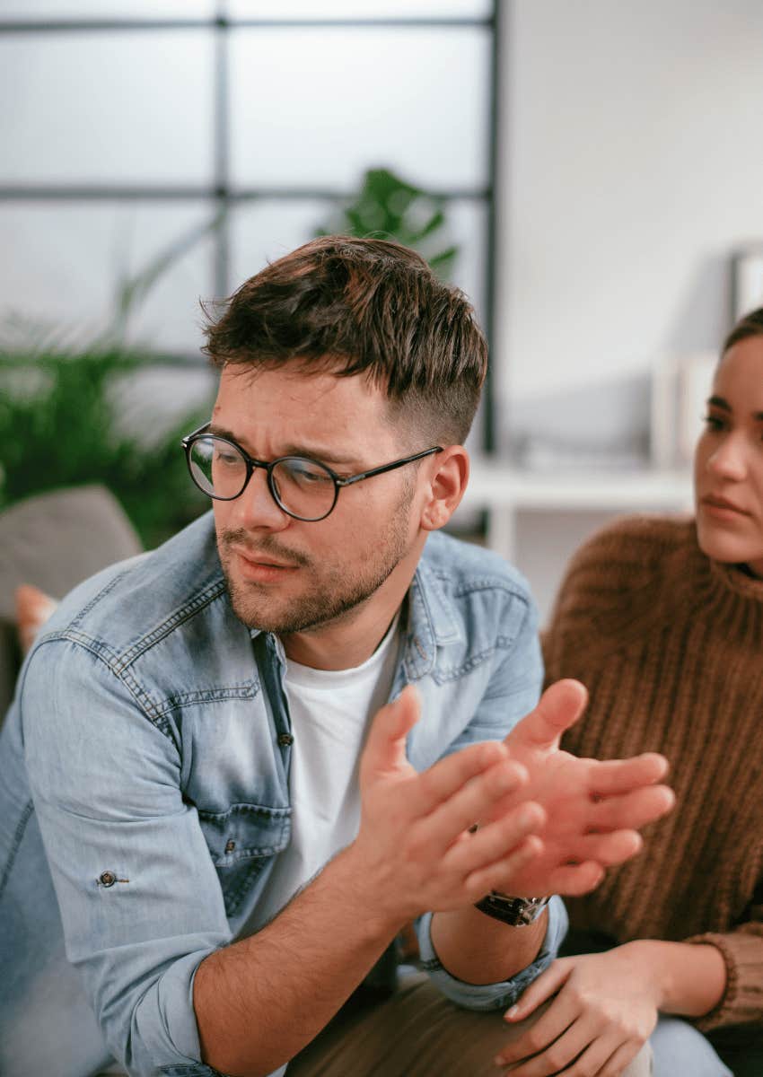 two people talking with man being disengaged