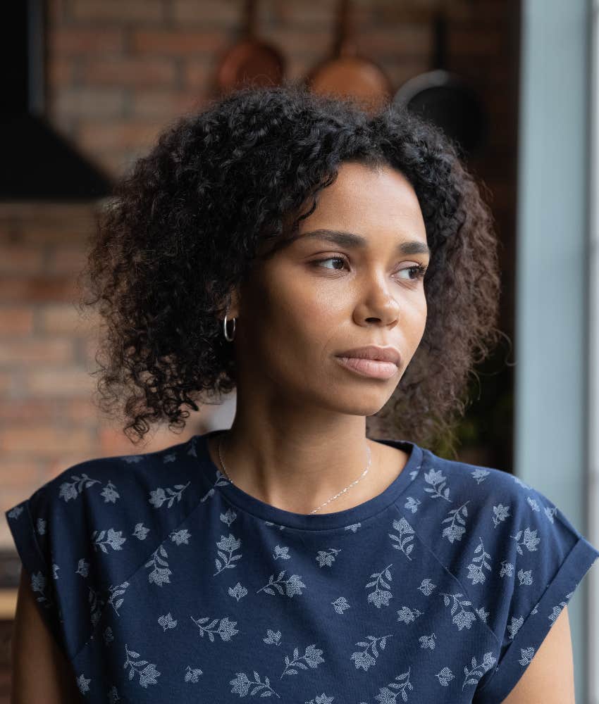 uncertain person looks away showing ambiguous grief