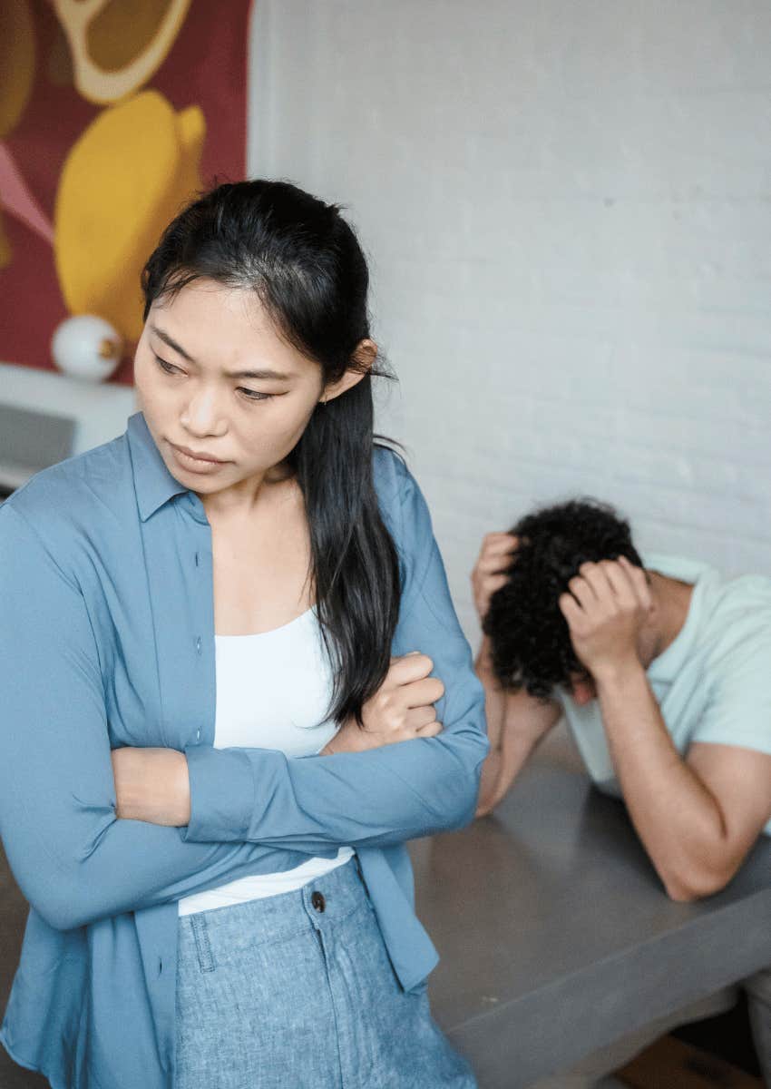 unhappy woman frustrated with man's red flag