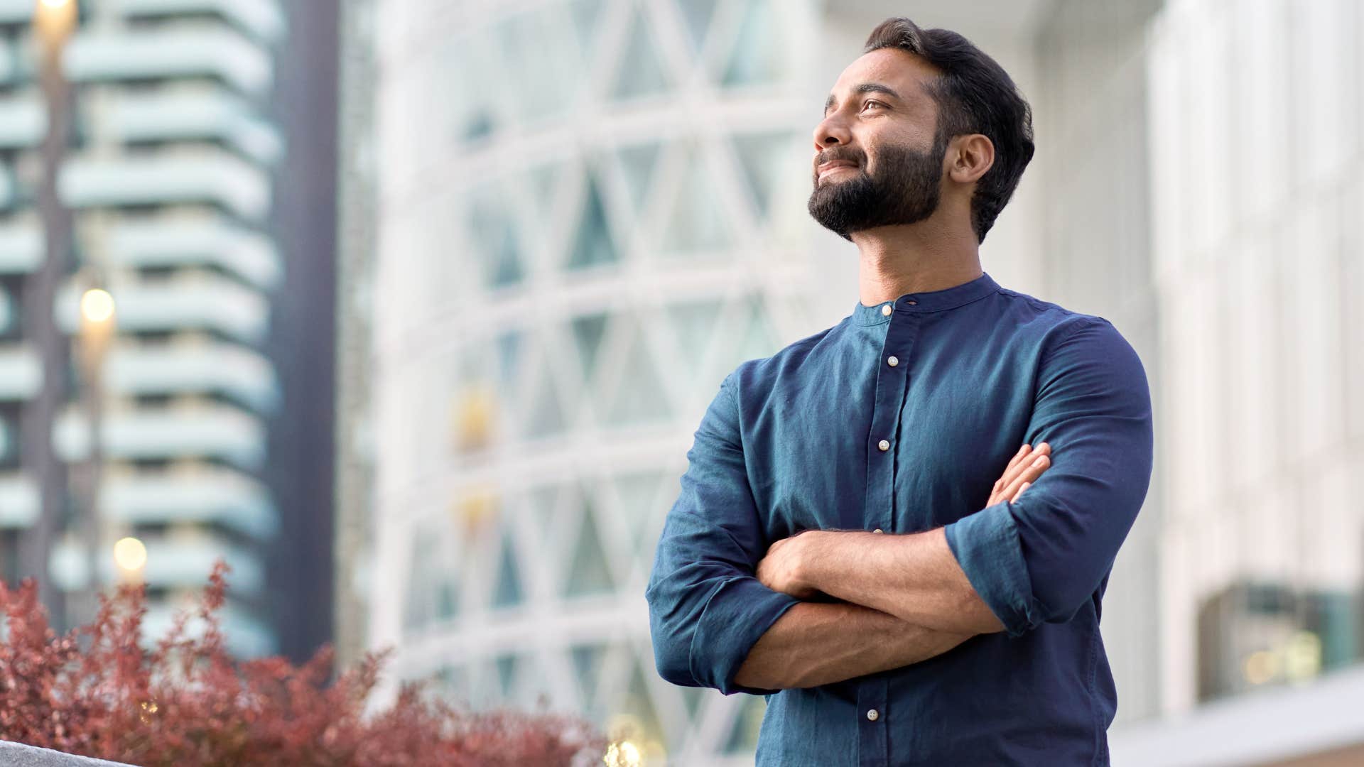 man in blue shirt looking confident as he thinks i don't need to think about it i just know