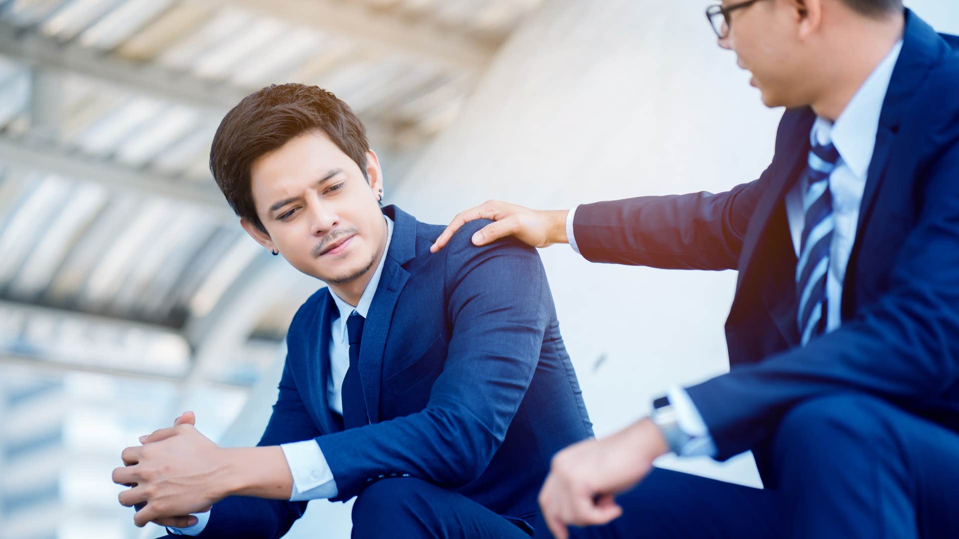 man telling his colleague to trust him