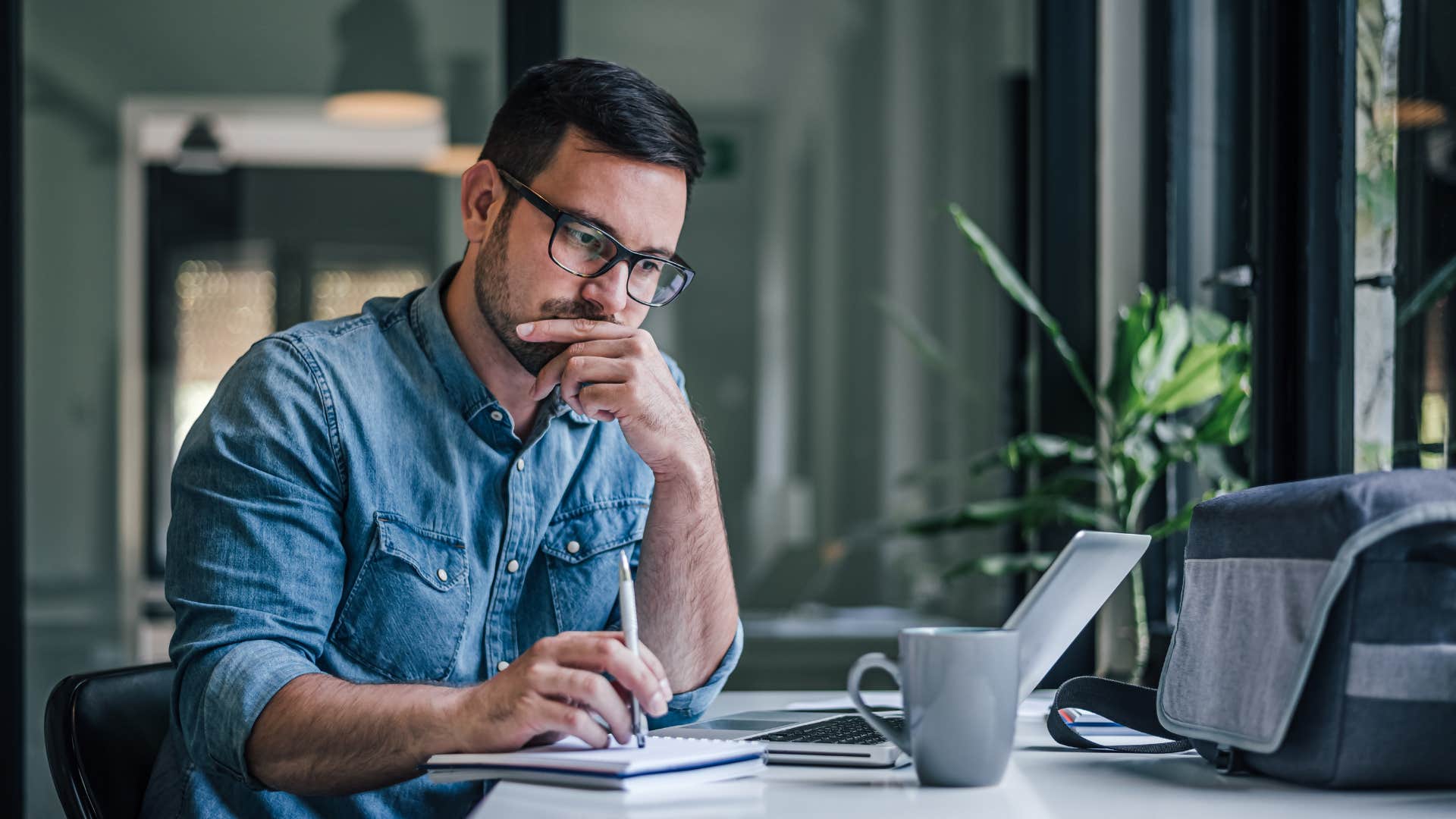 man with less ownership over his ideas since using AI