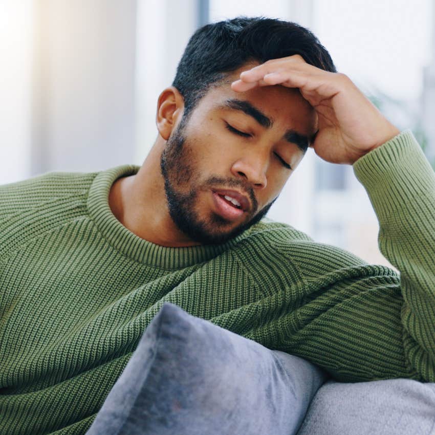 man who makes his relationship feel like a convenience looking annoyed