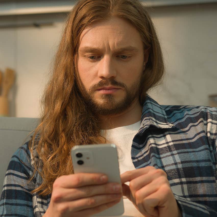 man who's stopped faking detachment on his phone talking to ex