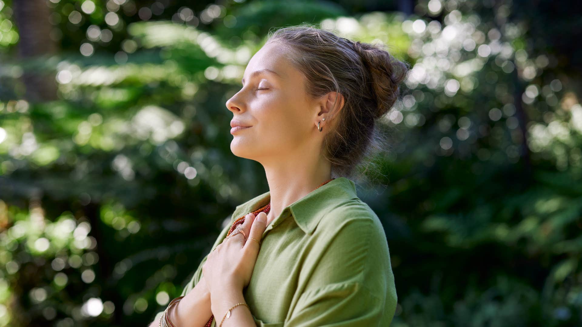 woman meditating outside as they're comfortable with silence