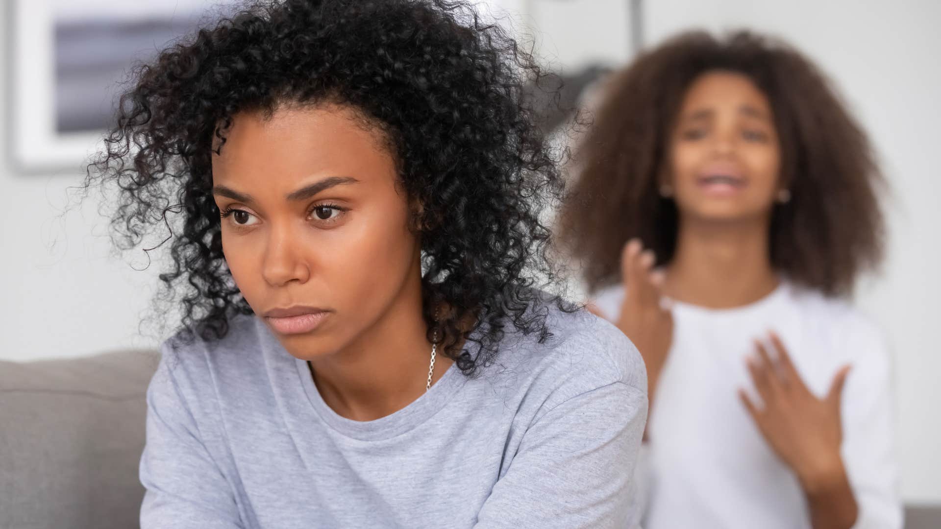 mother with a victim mentality turned away from upset daughter