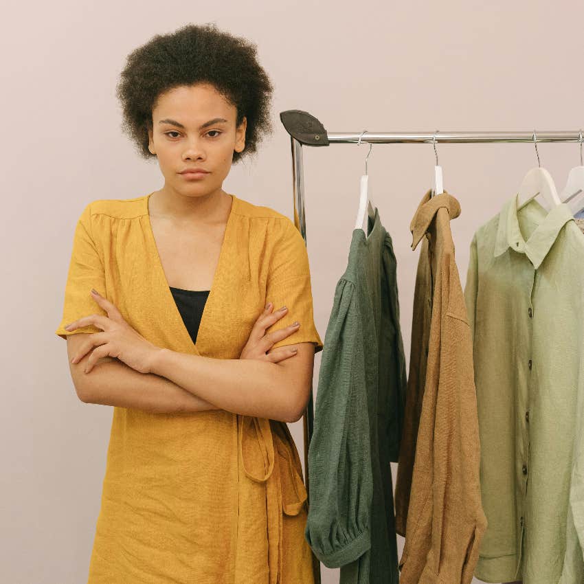 judgmental woman choosing an outfit