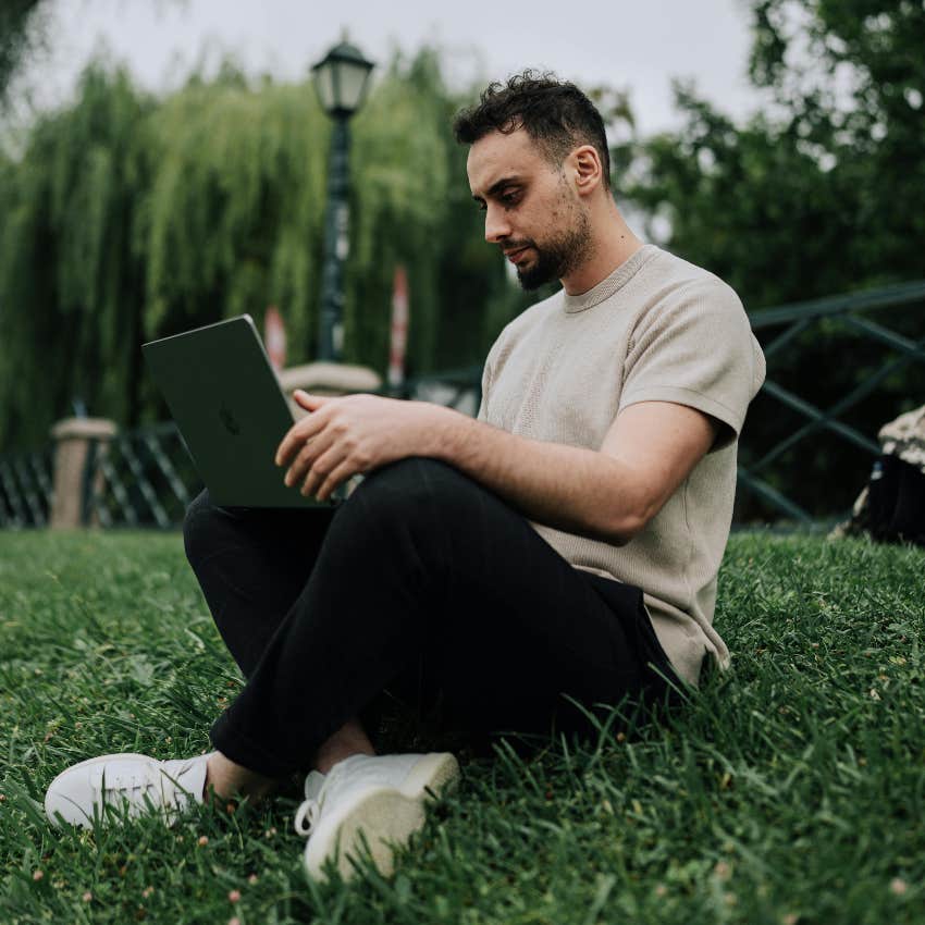 man looking at manosphere content online