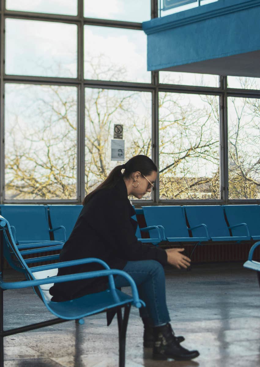 woman sitting alone in waiting area