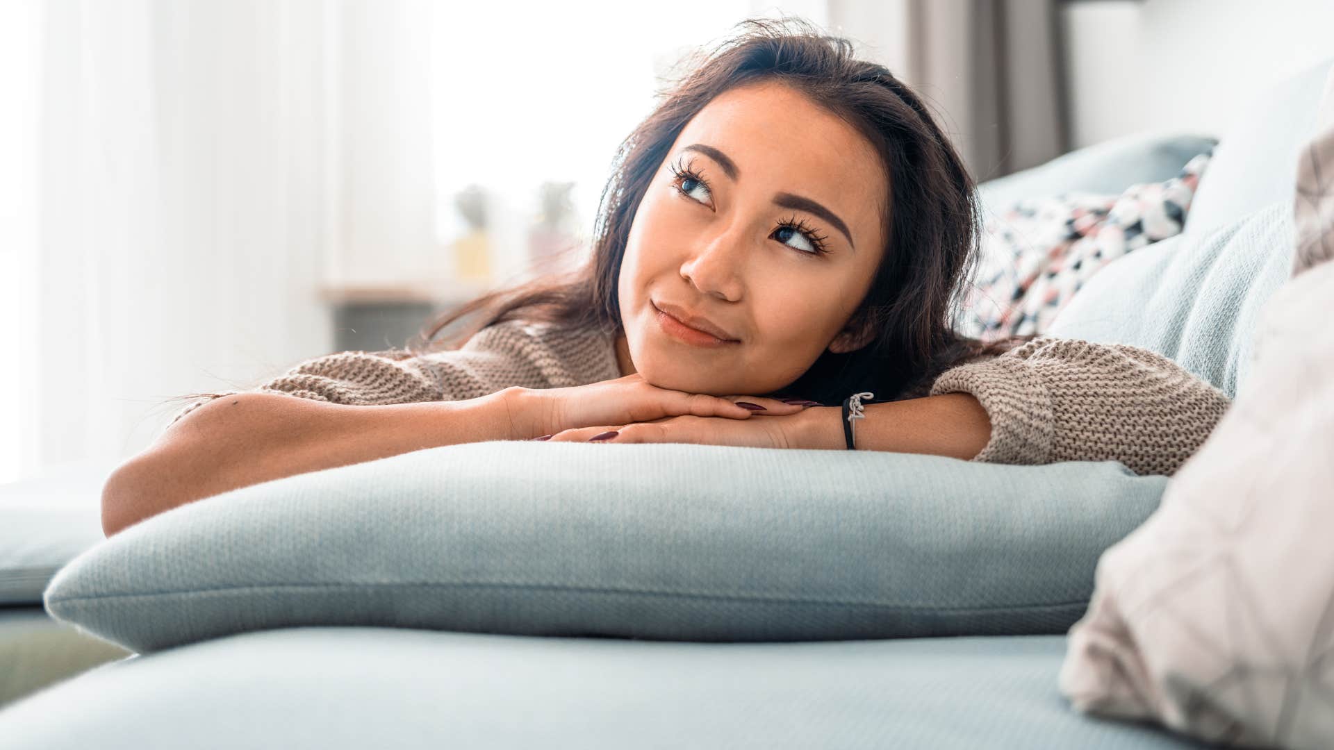 woman pretending to be happy with her life telling i just need to stay positive