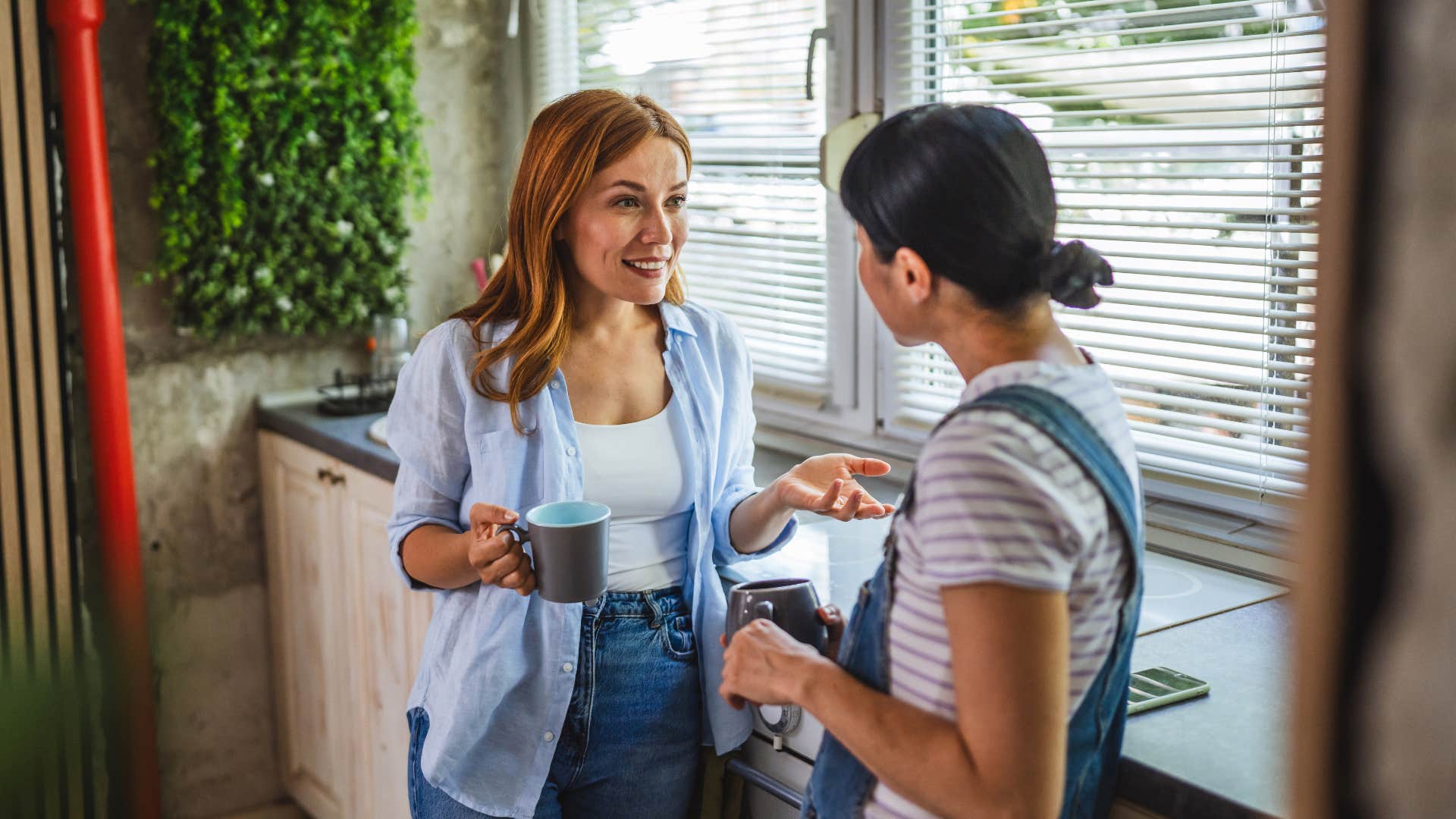 woman telling co-worker i should be happy over coffee