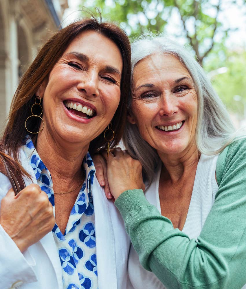 happy older women showing respected friendship